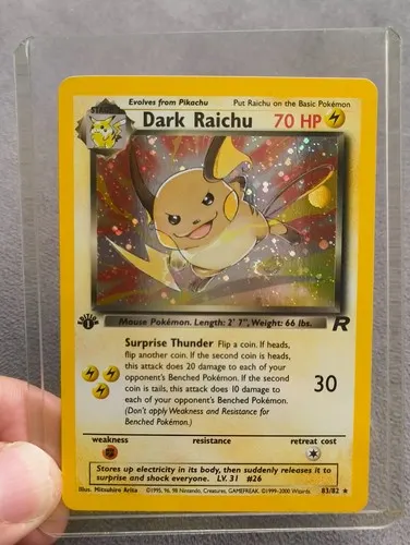 A first-edition holographic Dark Raichu from Team Rocket, in a protective case.